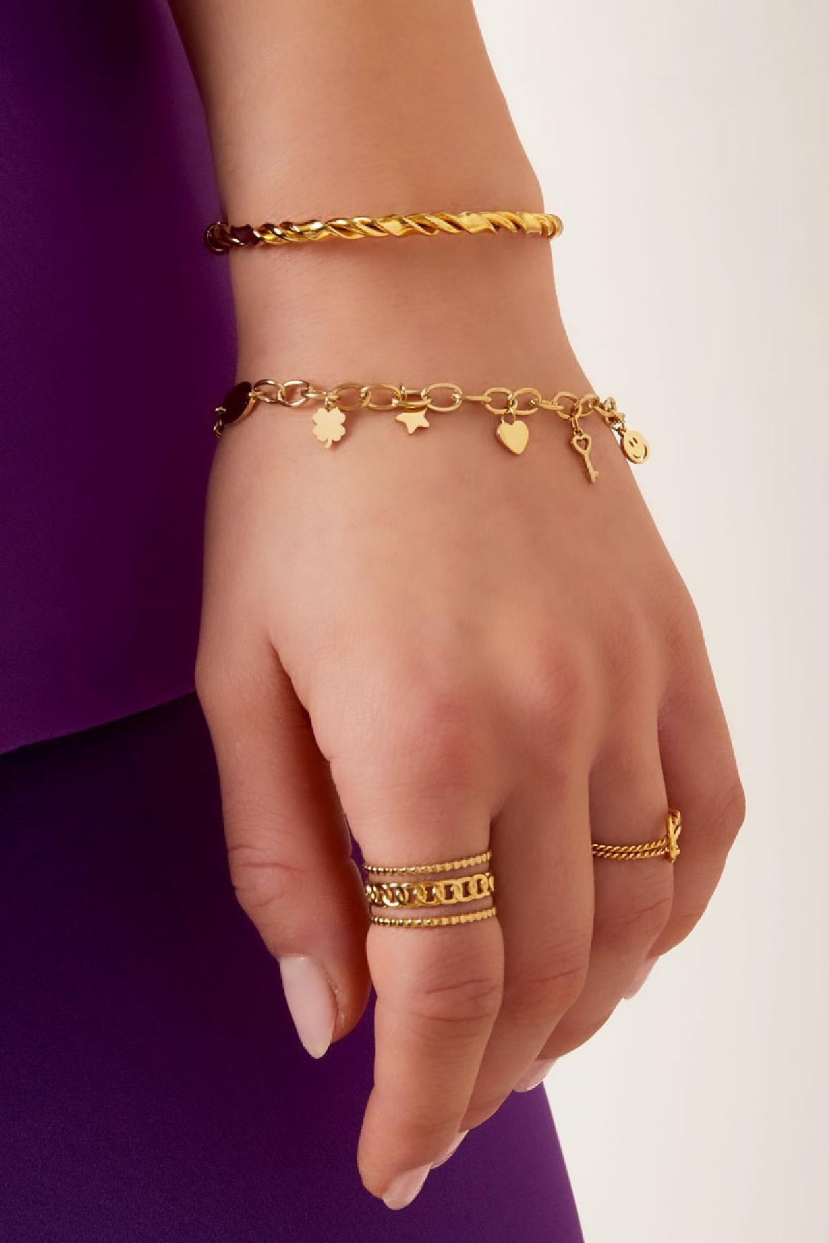 Armband met bedeltjes - goud